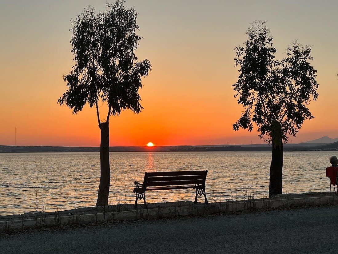 Sunset view over Akbuk bay from a hilltop path