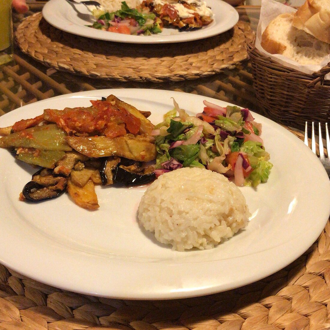 Counter at a Turkish lokanta with trays of hot dishes